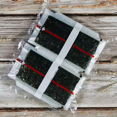 Τρίγωνο Onigiri Nori με ατμισμένα φύκια Τρίγωνο Laver φύκια σε πλαστική συσκευασία