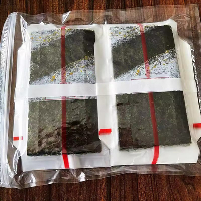 Τρίγωνο Onigiri Nori με ατμισμένα φύκια Τρίγωνο Laver φύκια σε πλαστική συσκευασία